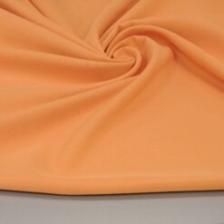 Warmer orangefarbener Köstümstoff - elastisch, mit seidigem Griff