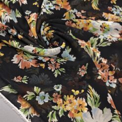 Schwarzer Georgette mit bunten Blumen - leicht und elegant
