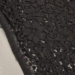 Schwarze reich bestickte elastische Spitze
