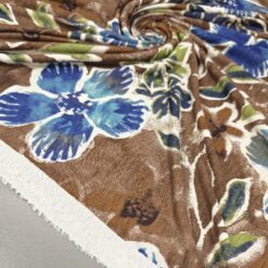 Viskosejersey - blaue Blumen auf braunen Grund